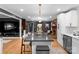 Bright, open kitchen with a large island, stainless steel appliances, and hardwood floors throughout at 801 Glendora Dr, Charlotte, NC 28212