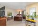 Bright bedroom with a bed, complemented by natural light and decorative lamps at 8033 Charter Oak Ln, Charlotte, NC 28226