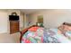 The bedroom is decorated with modern bedding, a wooden dresser, and modern artwork at 8033 Charter Oak Ln, Charlotte, NC 28226