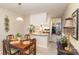 Bright dining area with views into the kitchen and living room offers a great open layout at 8033 Charter Oak Ln, Charlotte, NC 28226