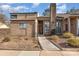 Inviting brick home showcasing a tidy front yard, walkway and a notable chimney feature at 8033 Charter Oak Ln, Charlotte, NC 28226