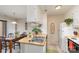 The bright kitchen is equipped with a stainless steel sink, white cabinets, and wooden countertops at 8033 Charter Oak Ln, Charlotte, NC 28226