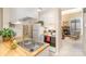 The bright kitchen with wooden countertops offers views of the stainless steel sink and living room at 8033 Charter Oak Ln, Charlotte, NC 28226