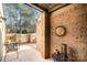 Secluded outdoor patio with a sun decoration, dining furniture, and mature trees at 8033 Charter Oak Ln, Charlotte, NC 28226