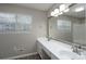 Bathroom vanity with double sinks, modern fixtures, and stylish mirror and lighting at 8125 Sheringham Way, Charlotte, NC 28227