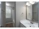 Bathroom featuring tub, shower, vanity, lighting and gray paint at 8125 Sheringham Way, Charlotte, NC 28227