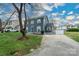 Exterior shot of this lovely two-story home with a long drive way and great looking lawn at 8125 Sheringham Way, Charlotte, NC 28227