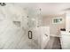 Elegant bathroom features tiled walk-in shower and soaker tub at 842 E Woodlawn Rd, Charlotte, NC 28209