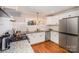 Bright and spacious kitchen featuring stainless steel appliances and granite countertops at 842 E Woodlawn Rd, Charlotte, NC 28209