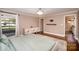 Cozy main bedroom with hardwood floors, accent rug and a contemporary dresser at 842 E Woodlawn Rd, Charlotte, NC 28209