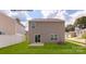 Backyard with a view of the building and a maintained lawn at 890 Two Brothers Ln, York, SC 29745