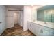 Bathroom with double sink vanity, large mirror, and a glass door shower at 890 Two Brothers Ln, York, SC 29745