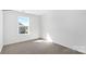 Neutral bedroom with carpet and natural light shining through the window at 890 Two Brothers Ln, York, SC 29745
