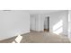 Neutral bedroom with carpet and natural light shining through the window at 890 Two Brothers Ln, York, SC 29745