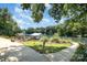 Lakefront property featuring a walkway and lake views at 9500 Windygap Rd, Charlotte, NC 28278