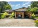 Inviting brick home featuring a cozy front porch, perfect for relaxing and enjoying the outdoors at 9500 Windygap Rd, Charlotte, NC 28278