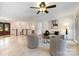 Open living space with tile floors, a cozy seating area, and stairs to the upper level at 9500 Windygap Rd, Charlotte, NC 28278