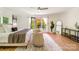 Spacious main bedroom with balcony access, neutral tones, and wood-look flooring at 9500 Windygap Rd, Charlotte, NC 28278