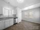 A kitchen with a breakfast nook area bathed in natural light at 10031 Orchard Grass Ct, Charlotte, NC 28278
