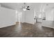 An open concept living area offering a clear view into the kitchen at 10031 Orchard Grass Ct, Charlotte, NC 28278