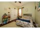 Bright bedroom with colorful nautical decor, hardwood floors, and a cozy area rug at 1022 Bimelech Dr, Indian Trail, NC 28079