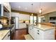Updated kitchen with stainless steel appliances, granite counters and eat in kitchen at 1022 Bimelech Dr, Indian Trail, NC 28079