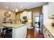 Gorgeous kitchen featuring granite counters, stainless appliances, and a large island at 1022 Bimelech Dr, Indian Trail, NC 28079