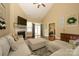 Open-concept living room with fireplace, vaulted ceiling and hardwood floors at 1022 Bimelech Dr, Indian Trail, NC 28079