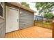 Charming wooden deck at the back of the house, a perfect place for relaxing and entertaining guests at 1022 Parker St, Monroe, NC 28112