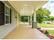 Spacious covered front porch featuring stylish columns and plenty of room for outdoor seating at 1022 Parker St, Monroe, NC 28112