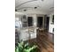 Modern kitchen with stainless steel appliances, quartz countertops, and an adjacent dining area at 1022 Parker St, Monroe, NC 28112