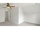 Bright bedroom featuring plush carpeting, a ceiling fan, and white walls at 10827 Azure Valley Pl, Charlotte, NC 28269