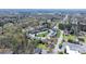 An aerial view displays the apartment complex nestled in a green, natural setting with nearby conveniences at 1100 22Nd Ne St # 502, Hickory, NC 28601