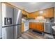 Functional kitchen featuring stainless steel appliances, ample counter space, and wooden cabinets for storage at 1100 22Nd Ne St # 502, Hickory, NC 28601