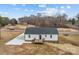 Back of home with a wooden deck perfect for enjoying the outdoors at 111 Proust Rd, Statesville, NC 28625