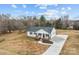 Charming single-story home with a welcoming front porch and spacious driveway at 111 Proust Rd, Statesville, NC 28625
