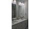 Elegant bathroom with double vanity, modern fixtures, and a well-lit mirror at 1124 Clouse St, Gastonia, NC 28052