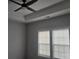 Ceiling view of a bedroom featuring modern ceiling fan, recessed lighting, and a tray ceiling at 1124 Clouse St, Gastonia, NC 28052