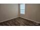 Well-lit bedroom with hardwood floors, ample natural light, and a serene ambiance at 1124 Clouse St, Gastonia, NC 28052