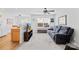 Bright living room featuring plush carpeting, neutral decor, and ample natural light at 11308 Morgan Valley Ln, Charlotte, NC 28270