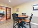 Cozy dining area with a round table, four chairs, and access to another living space at 119 Dills Dr, Dallas, NC 28034