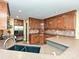 Well-equipped kitchen featuring wooden cabinets, tile backsplash, and stainless steel appliances at 119 Dills Dr, Dallas, NC 28034