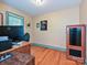 A home office featuring hardwood floors, natural light, and neutral wall colors at 119 Dills Dr, Dallas, NC 28034