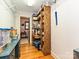 Organized pantry with wooden shelving and convenient access to a well-lit adjacent room at 119 Dills Dr, Dallas, NC 28034