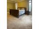 Bedroom with a queen bed and dark wood furniture at 124 Cedar Woods Dr, Mooresville, NC 28117