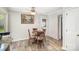 Cozy kitchen nook with a granite countertop and a door to the outside at 14525 Arbor Ridge Dr, Charlotte, NC 28273