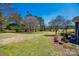 Expansive backyard featuring a well maintained yard and mature trees under a clear sky at 1515 Paul Boyd Rd, Clover, SC 29710