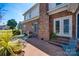 Backyard patio with a view of a brick house with a well maintained backyard at 1515 Paul Boyd Rd, Clover, SC 29710