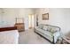 Cozy bedroom featuring a vintage sofa, dresser, and neutral color palette at 1515 Paul Boyd Rd, Clover, SC 29710