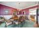 Formal dining room featuring a chandelier, classic decor, and an adjoining kitchen area at 1515 Paul Boyd Rd, Clover, SC 29710